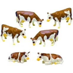 FIGURINES VACHES MARRONS ET BLANCHES