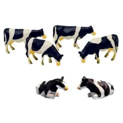 VACHES NOIRES ET BLANCHES